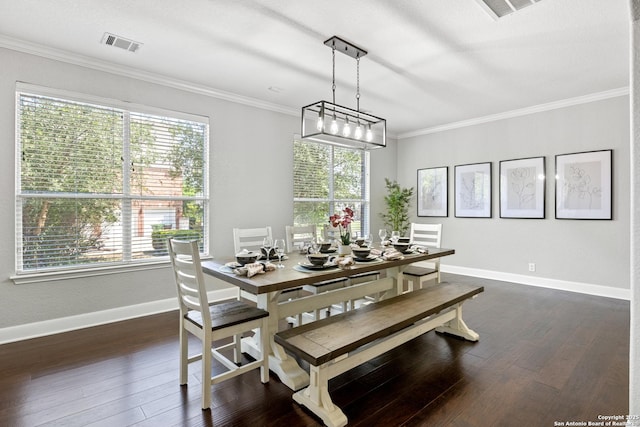 11227 Raw Sienna, Helotes, TX 78023 - dining room with dark wood-style floors, baseboards, and crown molding