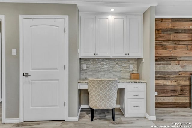 15592 Miller, Saint Hedwig, TX 78152 - home office featuring built in desk, light wood-style floors, and baseboards