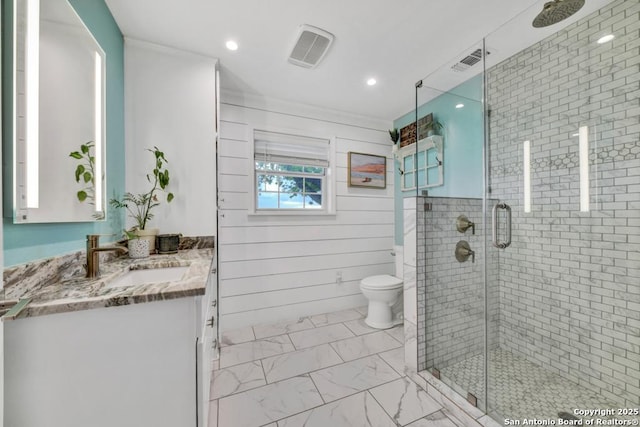 15592 Miller, Saint Hedwig, TX 78152 - bathroom featuring vanity, a stall shower, marble finish flooring, toilet, and crown molding