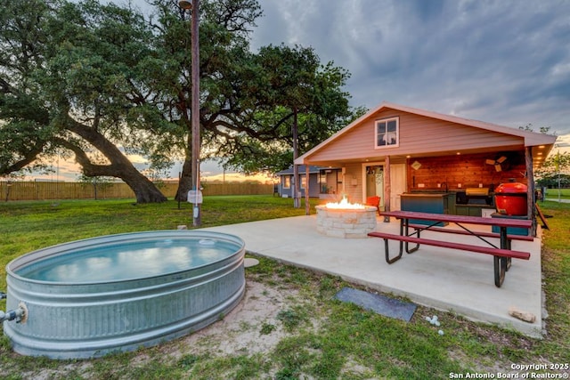15592 Miller, Saint Hedwig, TX 78152 - view of patio featuring a fire pit