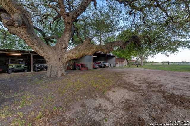 15592 Miller, Saint Hedwig, TX 78152 - view of front of house featuring a carport