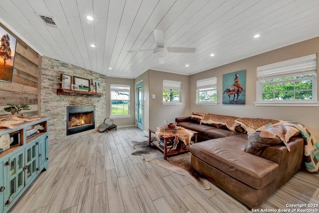 15592 Miller, Saint Hedwig, TX 78152 - living area featuring wooden ceiling, healthy amount of natural light, ceiling fan, light wood-type flooring, and recessed lighting