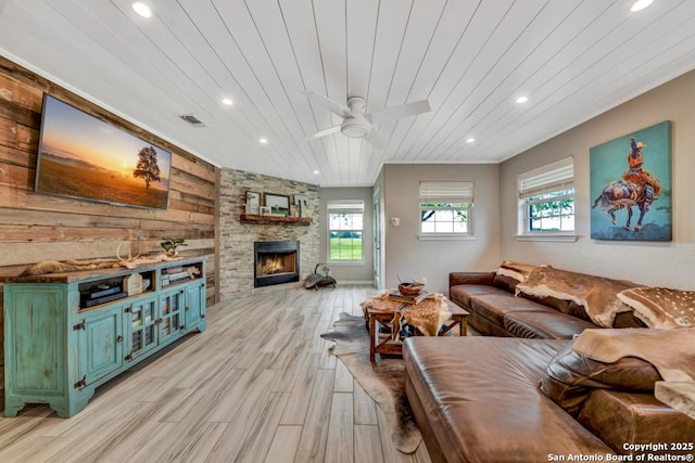 15592 Miller, Saint Hedwig, TX 78152 - living area featuring wooden ceiling, ceiling fan, a fireplace, light wood-style floors, and recessed lighting