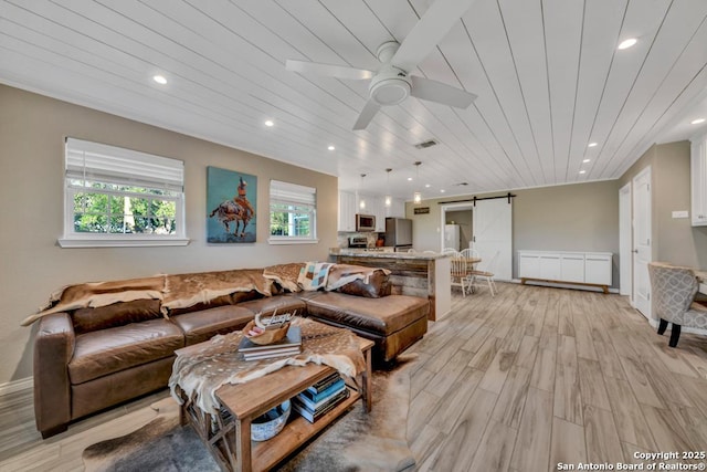 15592 Miller, Saint Hedwig, TX 78152 - living area with a barn door, wood ceiling, light wood finished floors, a ceiling fan, and recessed lighting