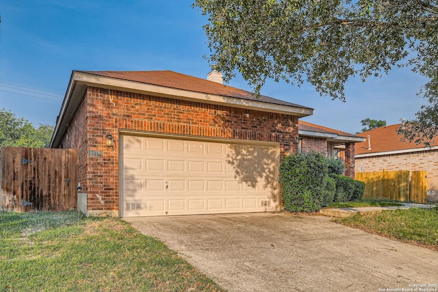 2510 Sage Holw, San Antonio, TX 78251 - view of front of home with brick siding, an attached garage, driveway, and a chimney