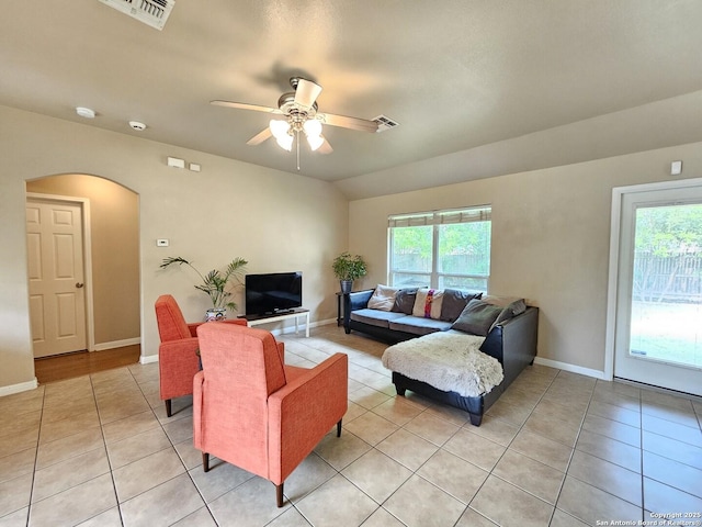 2115 Bentwood, New Braunfels, TX 78130 - living room with arched walkways, plenty of natural light, and light tile patterned floors