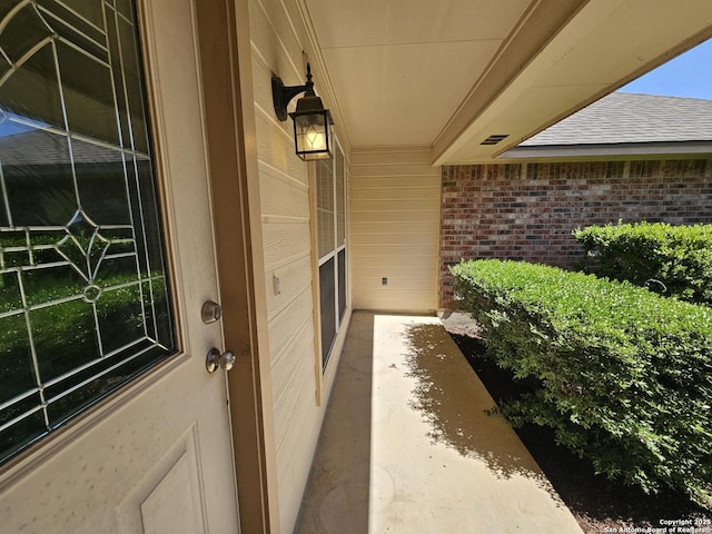 2115 Bentwood, New Braunfels, TX 78130 - doorway to property with brick siding