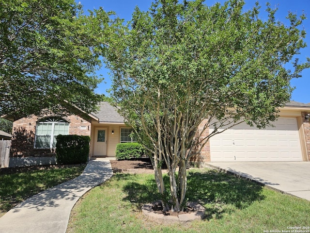 2115 Bentwood, New Braunfels, TX 78130 - obstructed view of property featuring brick siding, concrete driveway, and a garage