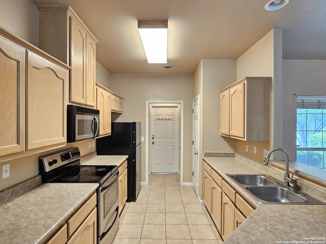 2115 Bentwood, New Braunfels, TX 78130 - kitchen featuring electric stove, light brown cabinets, a sink, and light tile patterned flooring