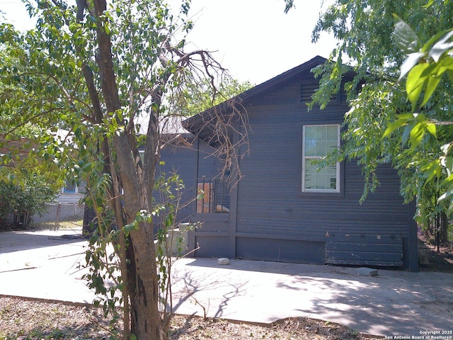2619 E Houston St, San Antonio, TX 78202 - view of home's exterior with a patio