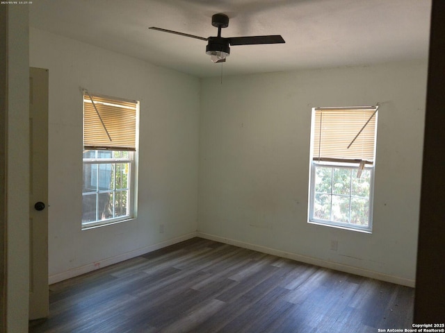2619 E Houston St, San Antonio, TX 78202 - unfurnished room with wood finished floors, a ceiling fan, and baseboards