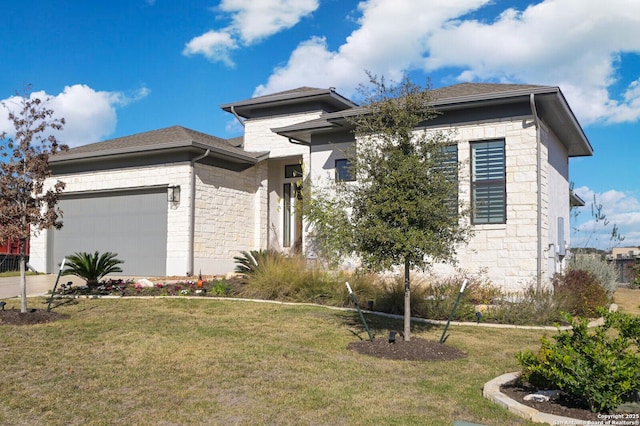 23402 Grande Vis, San Antonio, TX 78261 - prairie-style home featuring stone siding, an attached garage, and a front yard