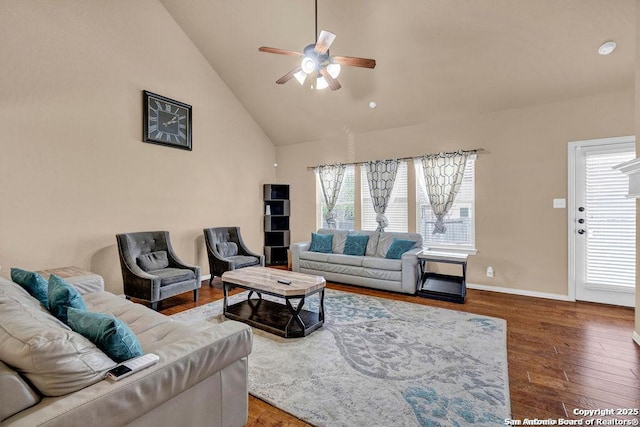 1427 Sparrow Song, San Antonio, TX 78260 - living area with a ceiling fan, high vaulted ceiling, wood finished floors, and baseboards
