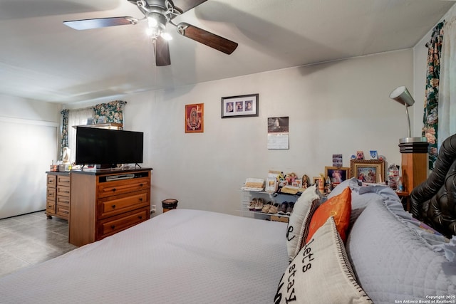 243 Future Dr, San Antonio, TX 78213 - tiled bedroom with a ceiling fan