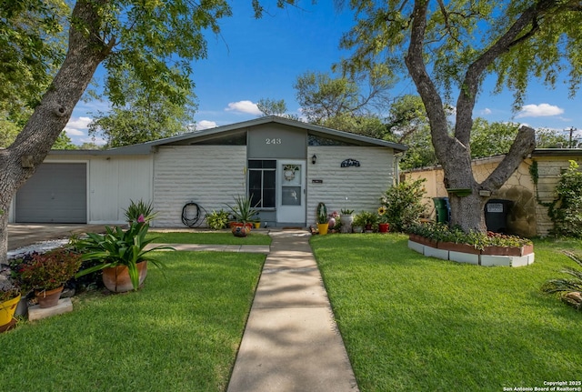 243 Future Dr, San Antonio, TX 78213 - view of front of property featuring an attached garage, a front lawn, and driveway