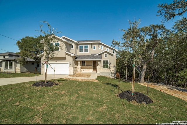 8119 Ventura Blvd, Selma, TX 78154 - view of front of property with stucco siding, driveway, stone siding, an attached garage, and a front yard