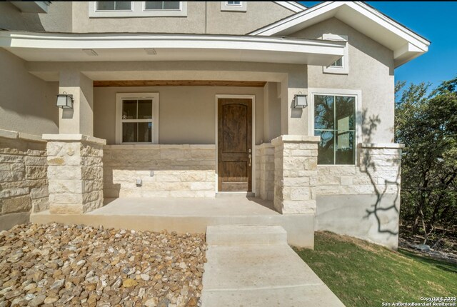 8119 Ventura Blvd, Selma, TX 78154 - entrance to property featuring stone siding and stucco siding