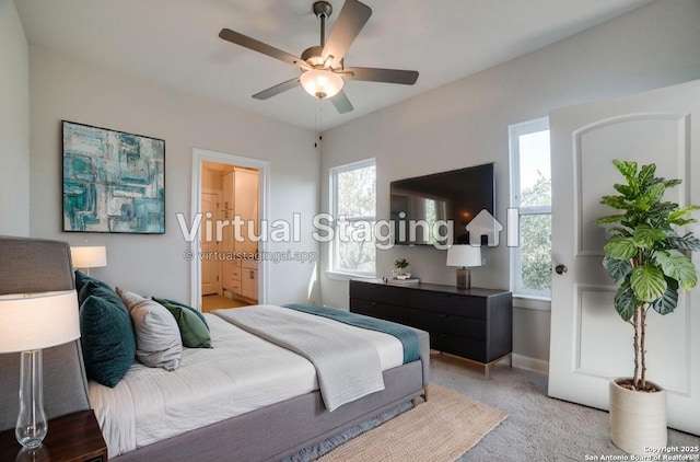 8119 Ventura Blvd, Selma, TX 78154 - bedroom with light colored carpet, connected bathroom, baseboards, and a ceiling fan
