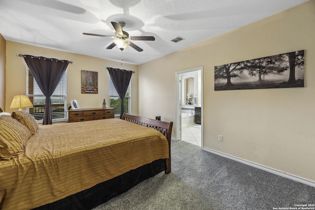 18131 Muir Glen Dr, San Antonio, TX 78257 - bedroom featuring carpet flooring, ensuite bath, baseboards, and a ceiling fan