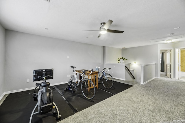 18131 Muir Glen Dr, San Antonio, TX 78257 - exercise area featuring a ceiling fan, baseboards, attic access, and a textured ceiling
