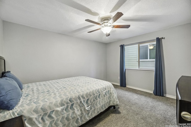 18131 Muir Glen Dr, San Antonio, TX 78257 - carpeted bedroom featuring baseboards, a textured ceiling, and a ceiling fan