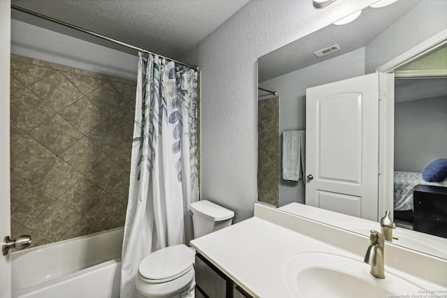 18131 Muir Glen Dr, San Antonio, TX 78257 - bathroom with shower / bath combo, vanity, toilet, a textured wall, and ensuite bathroom
