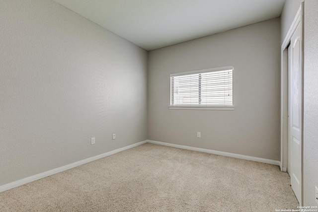 1023 Sundance Fall, San Antonio, TX 78245 - unfurnished bedroom with carpet, baseboards, and a closet