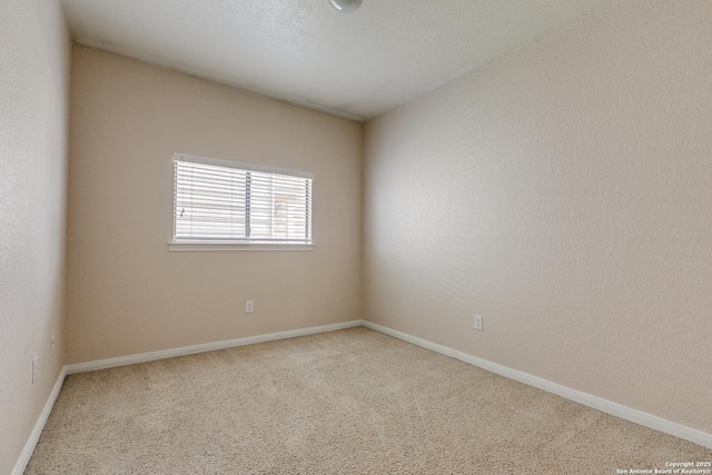1023 Sundance Fall, San Antonio, TX 78245 - carpeted empty room featuring baseboards