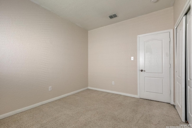 1023 Sundance Fall, San Antonio, TX 78245 - unfurnished room with light carpet, baseboards, and a smoke detector