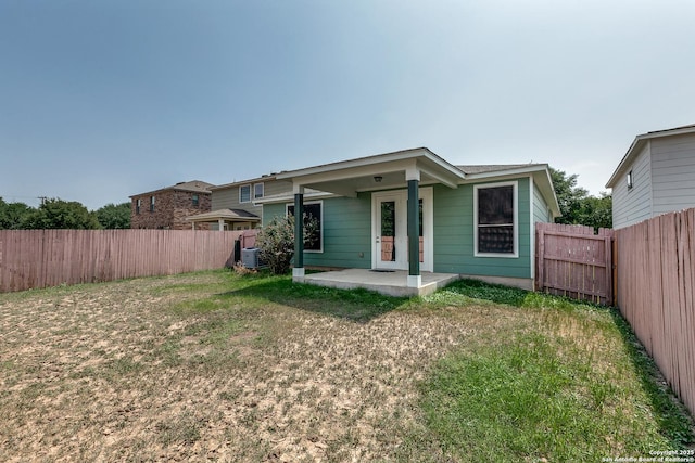 1023 Sundance Fall, San Antonio, TX 78245 - rear view of property with a patio area and central AC unit