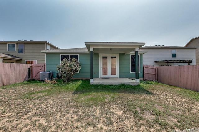 1023 Sundance Fall, San Antonio, TX 78245 - back of property featuring central air condition unit, french doors, and a patio area