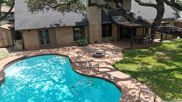 2922 Low Oak St, San Antonio, TX 78232 - swimming pool featuring a patio area, french doors, and a lawn