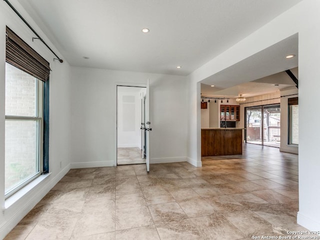 2922 Low Oak St, San Antonio, TX 78232 - unfurnished room featuring baseboards, recessed lighting, and a chandelier