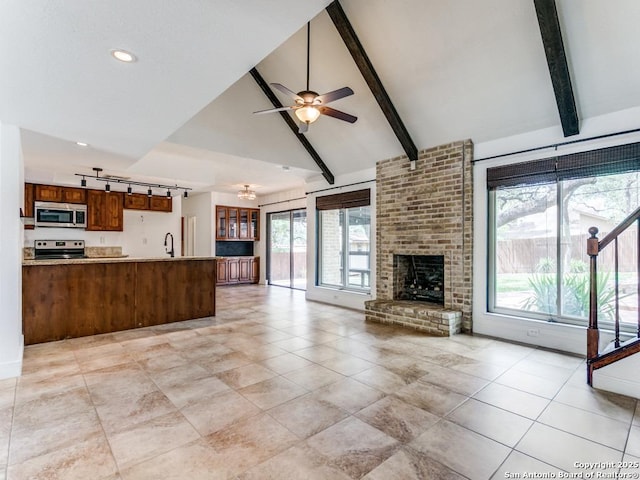 2922 Low Oak St, San Antonio, TX 78232 - unfurnished living room with ceiling fan, a brick fireplace, and recessed lighting