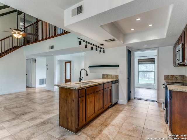 2922 Low Oak St, San Antonio, TX 78232 - kitchen featuring a sink, appliances with stainless steel finishes, light stone countertops, baseboards, and recessed lighting