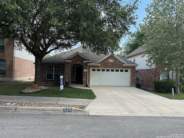 520 Ginsberg, Schertz, TX 78154 - view of front of house with a garage, concrete driveway, roof with shingles, and brick siding