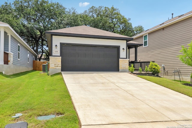 158 Canopy Oak, New Braunfels, TX 78130 - view of front facade with stone siding, driveway, an attached garage, and cooling unit
