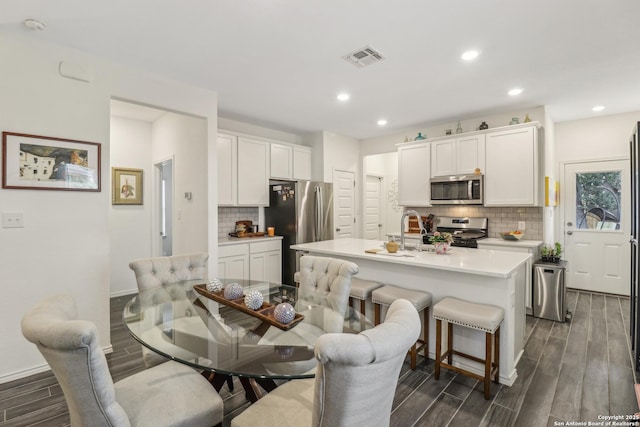 158 Canopy Oak, New Braunfels, TX 78130 - dining room with wood finish floors, recessed lighting, and baseboards