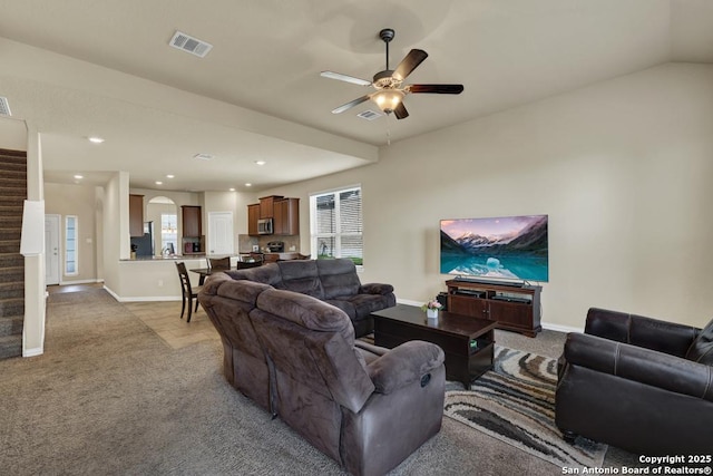 1902 Kalli Jo, New Braunfels, TX 78130 - living area with light colored carpet, stairs, a ceiling fan, baseboards, and recessed lighting