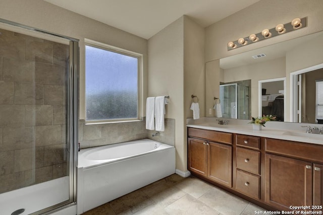 1902 Kalli Jo, New Braunfels, TX 78130 - bathroom with a shower stall, a bath, double vanity, tile patterned floors, and a spacious closet