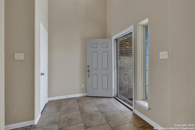 1902 Kalli Jo, New Braunfels, TX 78130 - entryway featuring baseboards and a high ceiling