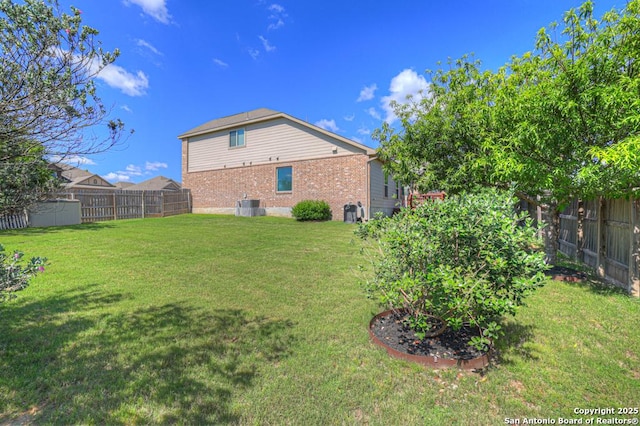 1902 Kalli Jo, New Braunfels, TX 78130 - rear view of house with brick siding and central air condition unit