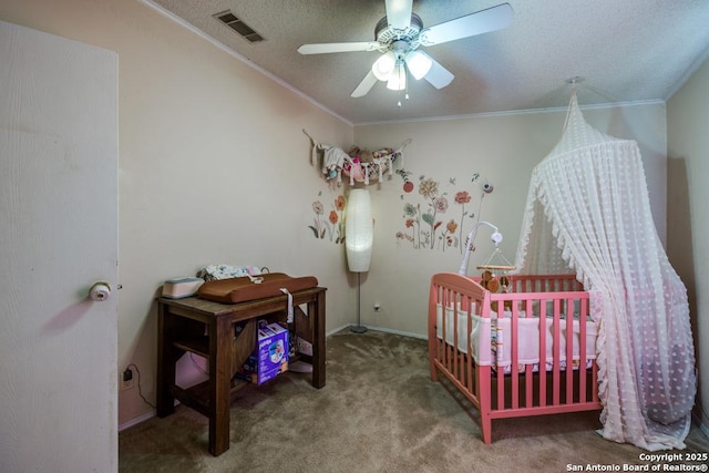 22337 Red Sand, San Antonio, TX 78264 - carpeted bedroom with ornamental molding, ceiling fan, and a textured ceiling