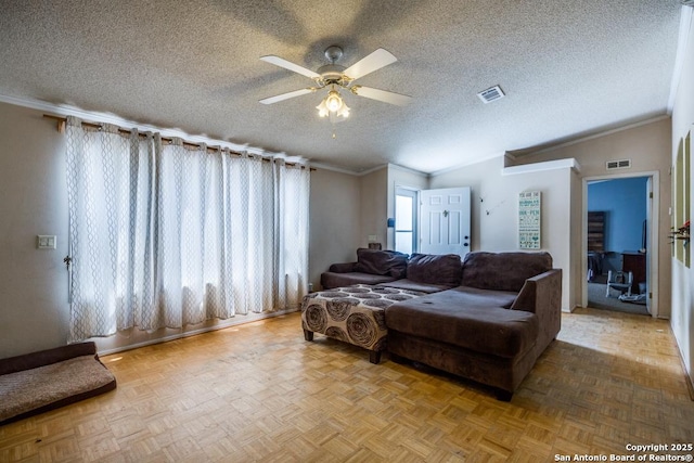 22337 Red Sand, San Antonio, TX 78264 - living room with a textured ceiling, ceiling fan, lofted ceiling, and ornamental molding