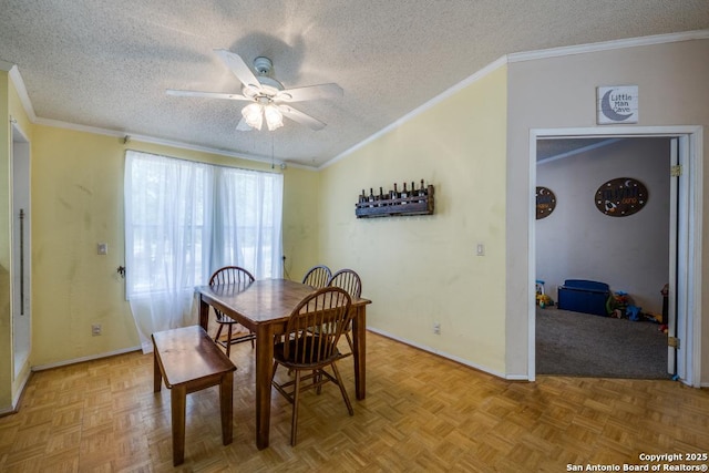 22337 Red Sand, San Antonio, TX 78264 - dining area with crown molding, a textured ceiling, a ceiling fan, and baseboards