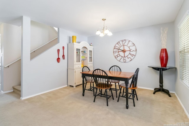 11807 Amber Tree, San Antonio, TX 78254 - dining space with stairs, light colored carpet, a chandelier, and baseboards
