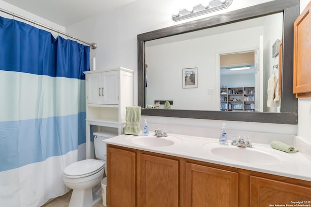 11807 Amber Tree, San Antonio, TX 78254 - bathroom featuring toilet, double vanity, a shower with shower curtain, and tile patterned flooring