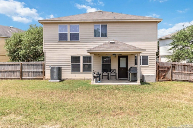 11807 Amber Tree, San Antonio, TX 78254 - back of house with central air condition unit, a patio area, roof with shingles, and a gate