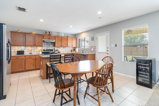 11807 Amber Tree, San Antonio, TX 78254 - dining area featuring wine cooler, light tile patterned floors, recessed lighting, and baseboards