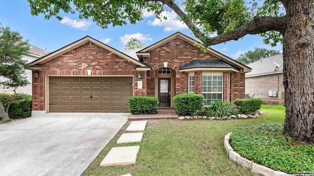 21627 Rio Comal, San Antonio, TX 78259 - traditional home featuring brick siding, an attached garage, driveway, and a front lawn
